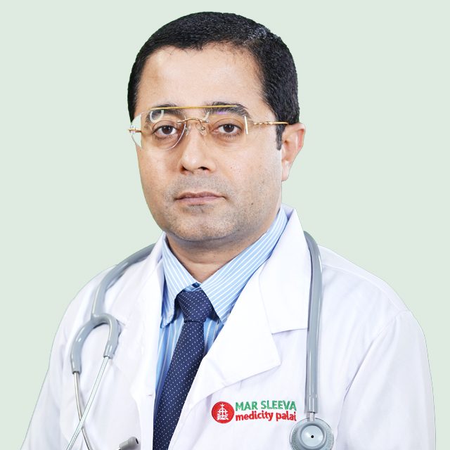 Dr. Manuel John