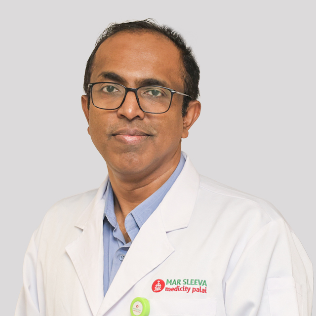 Dr. Manjit George